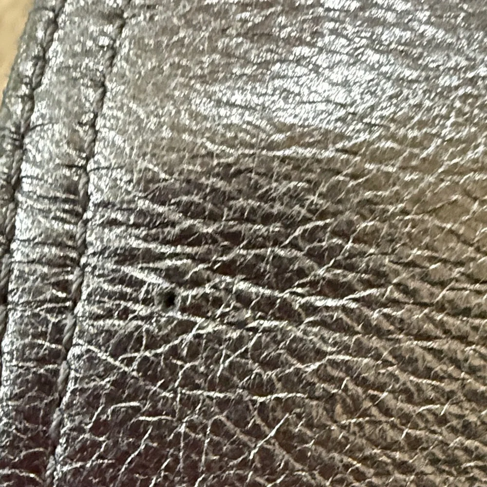 B. Makowsky Metallic Chain Wallet